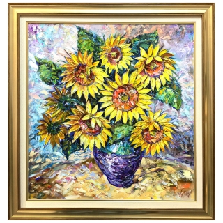 Bouquet of sunflowers in a blue vase