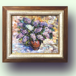 Lilacs in a red vase