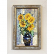 Bouquet of sunflowers in a blue vase
